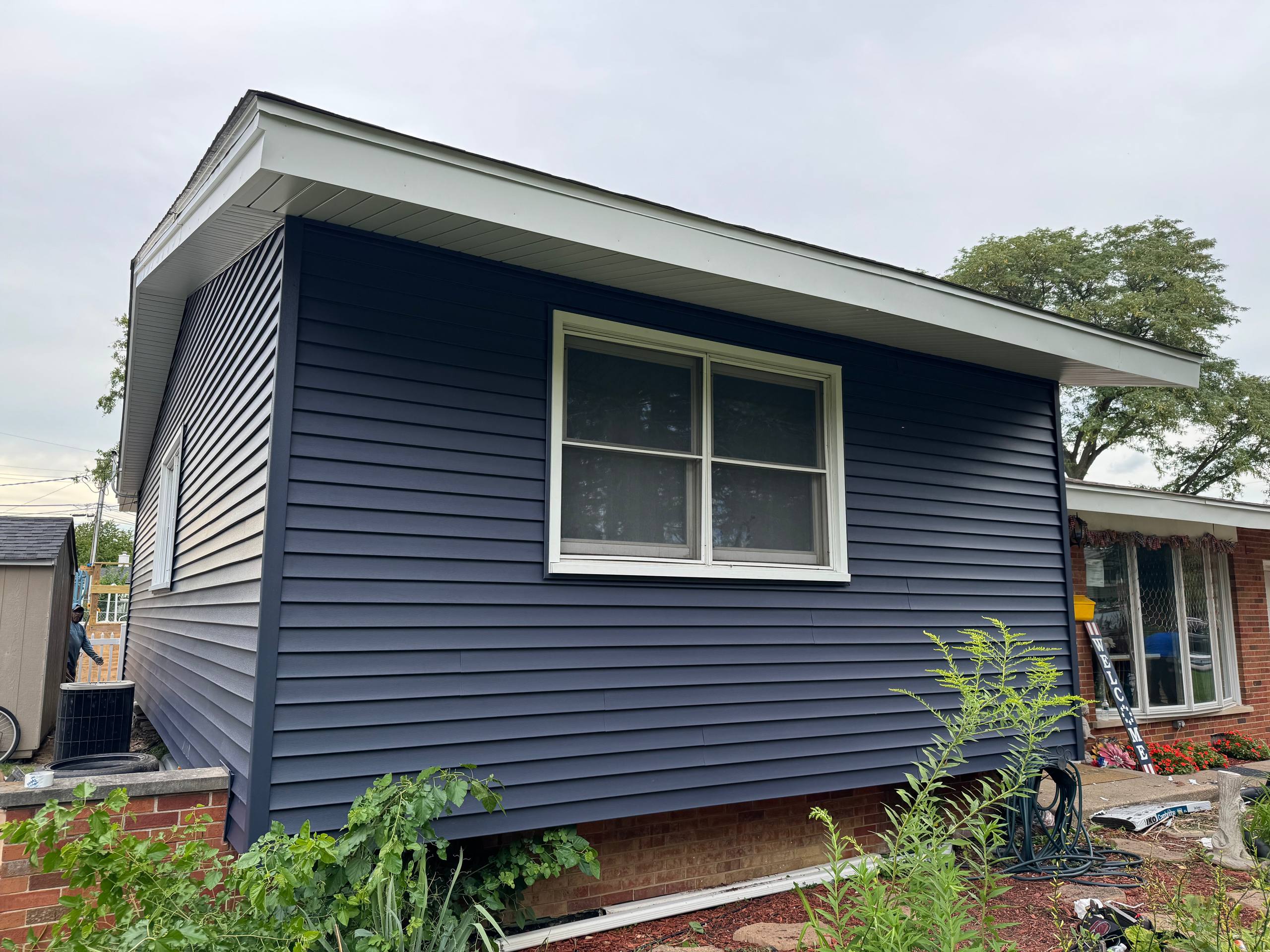 Completed siding project by Full Quality Exteriors